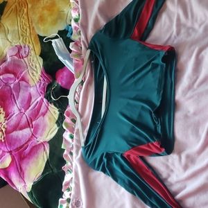 Green crop top with Red lining on the arms